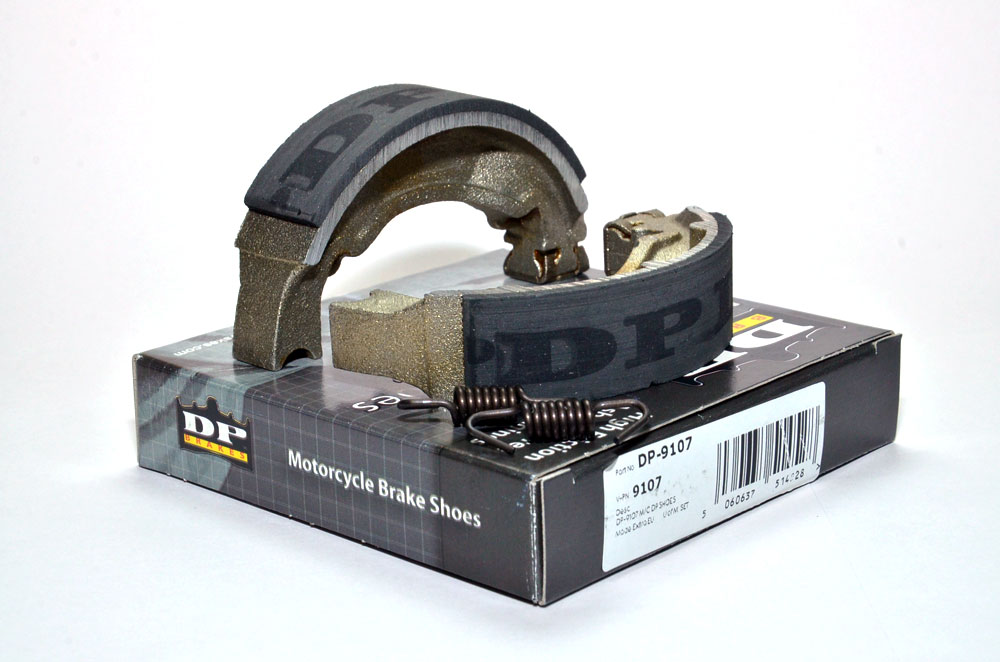 9107 DP Brakes motorcycle brake shoes on top of their packaging