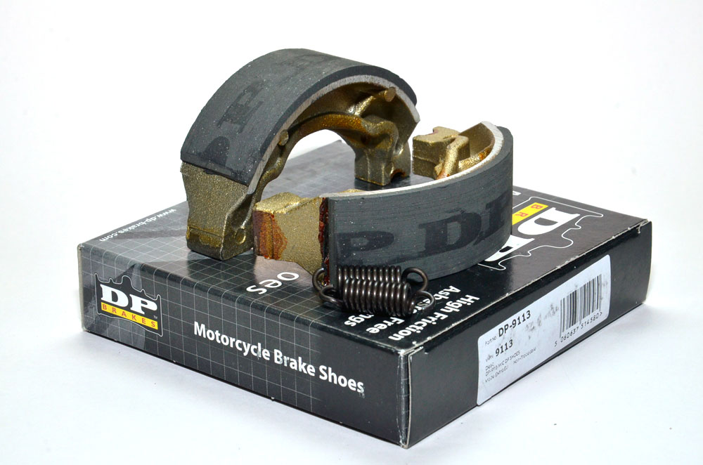 9113 DP Brakes motorcycle brake shoes on top of their packaging